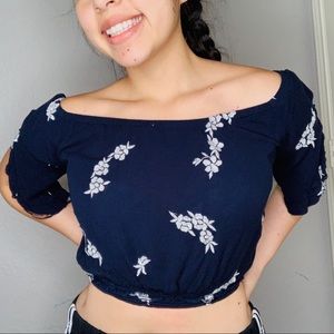 Navy blue crop-top with white flowers details